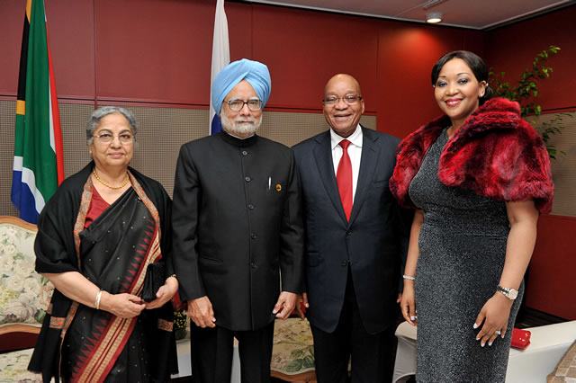 President Zuma and his wife Thobeka Zuma welcome Indian Prime Minister Manmohan Singh and his wife Gursharan Kaur before the start of the cultural evening marking the official opening of the 5th BRICS summit held at Inkosi Luthuli International Conference Centre in Durban. Source: GCIS