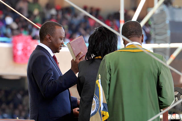 President elect Uhuru Kenyatta taking the oath of office during the inauguration ceremony held at the Kasarani sports complex in Nairobi. Source: GCIS