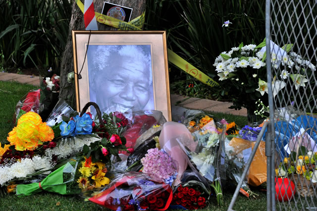 Flowers laid outside Madiba's house in Houghton. Source: GCIS