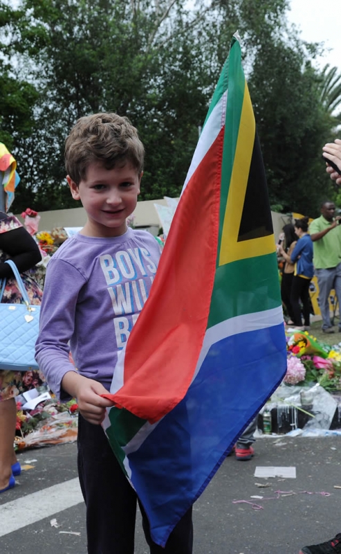 South Africans from all walks of life and ages came to lay flowers and show their support outside Madiba’s house in Houghton. Source: GCIS