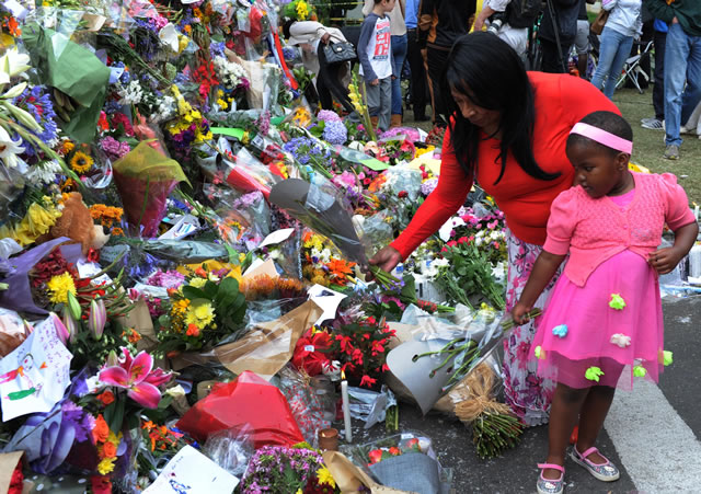 South Africans from all walks of life and ages came to lay flowers and show their support outside Madiba’s house in Houghton. Source: GCIS