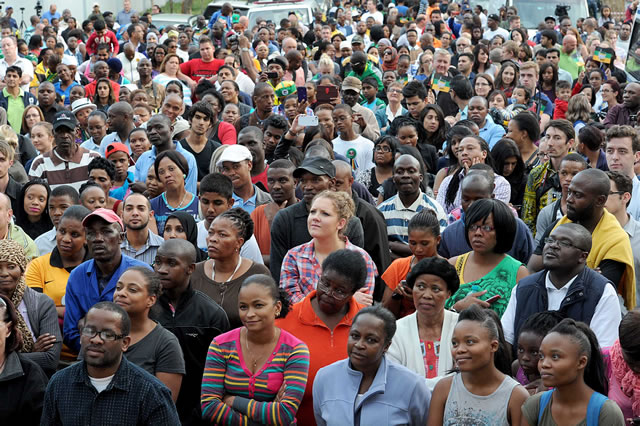 People from all walks of life gather to pay tribute to Mandela. Source: GCIS