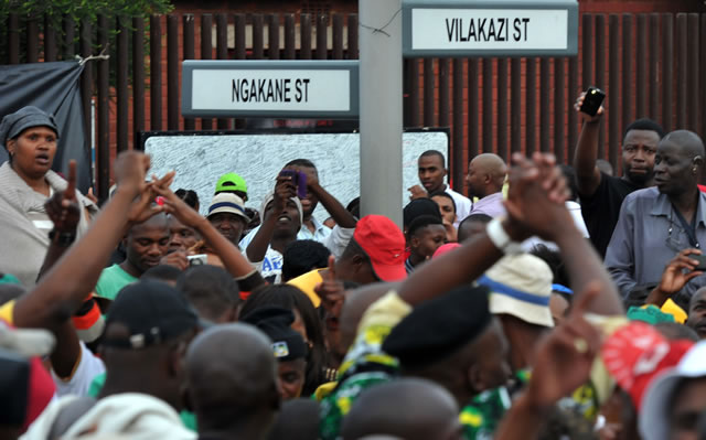 People gather at Madiba's old house in Vilakazi Street, Soweto. Source: GCIS