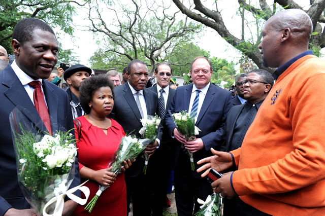 Mandla Mandela receiving Sports Minister Fikile Mbalula, Arts Minister Paul Mashatile and Deputy Minister Gert Oosthysen accompanied at Mandela's house in Houghton. Source: GCIS