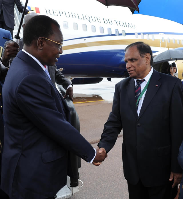 International Relations Deputy Minister Ebrahim Ebrahim receiving Chad President Idriss Deby on his arrival at Waterkloof Air Force Base in Pretoria to attend the funeral of former President Nelson Mandela. Source: GCIS