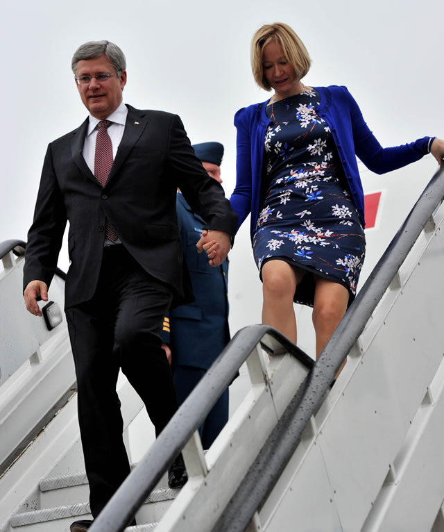 Canada Prime Minister Stephen Harper and his wife at Waterkloof ahead of Madiba's memorial. Source: GCIS