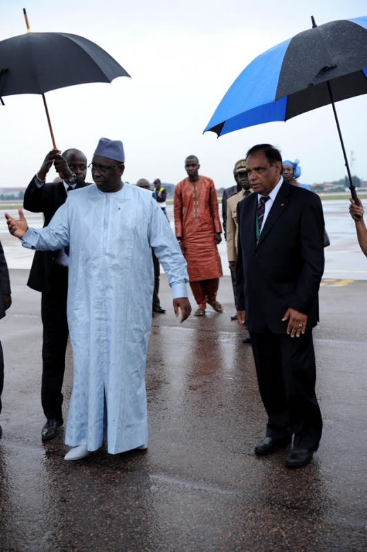 International Relations Deputy Minister Ebrahim Ebrahim receiving Senegal President Macky Sall at Waterkloof Air Force Base in Pretoria. Source: GCIS