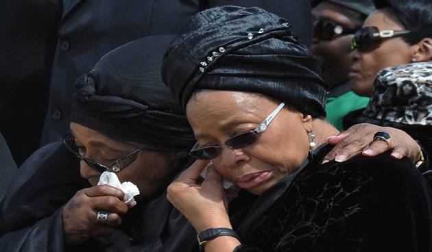 Winnie Madikizela Mandela and Graca Machel at Mthatha Airport during Madiba's remains' arrival. Source: GCIS