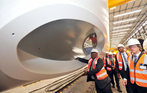 President Ramaphosa, with dti Minister Rob Davies, on a guided tour of the GRI Towers factory that forms part of the Special Economic Zone in Atlantis.