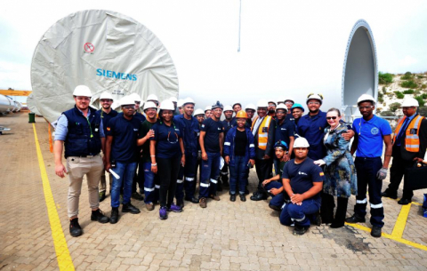 President Ramaphosa, with dti Minister Rob Davies, on a guided tour of the GRI Towers factory that forms part of the Special Economic Zone in Atlantis.