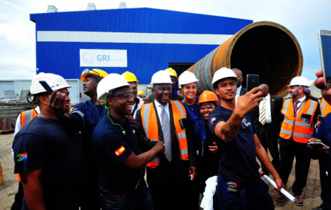 President Ramaphosa, with dti Minister Rob Davies, on a guided tour of the GRI Towers factory that forms part of the Special Economic Zone in Atlantis.