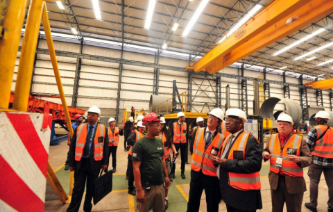 President Ramaphosa, with dti Minister Rob Davies, on a guided tour of the GRI Towers factory that forms part of the Special Economic Zone in Atlantis.