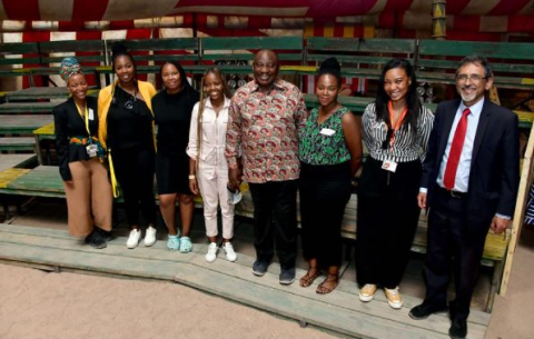 resident Cyril Ramaphosa and Minister of Trade, Industry and Competition, Ebrahim Patel, with Netflix representatives, THE Film Afrika team, and Academy of Creative Excellence (ACE) mentees during the President's visit to Project Panda at the Cape Town Film Studios.